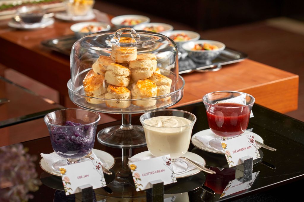 Grand Hyatt Manila unveils New Merienda Cena Menu and a Seasonal Afternoon Tea Experience at The Lounge 2 Traditional homemade plan and raisin scones with strawberry and ube jams as well as clotted cream